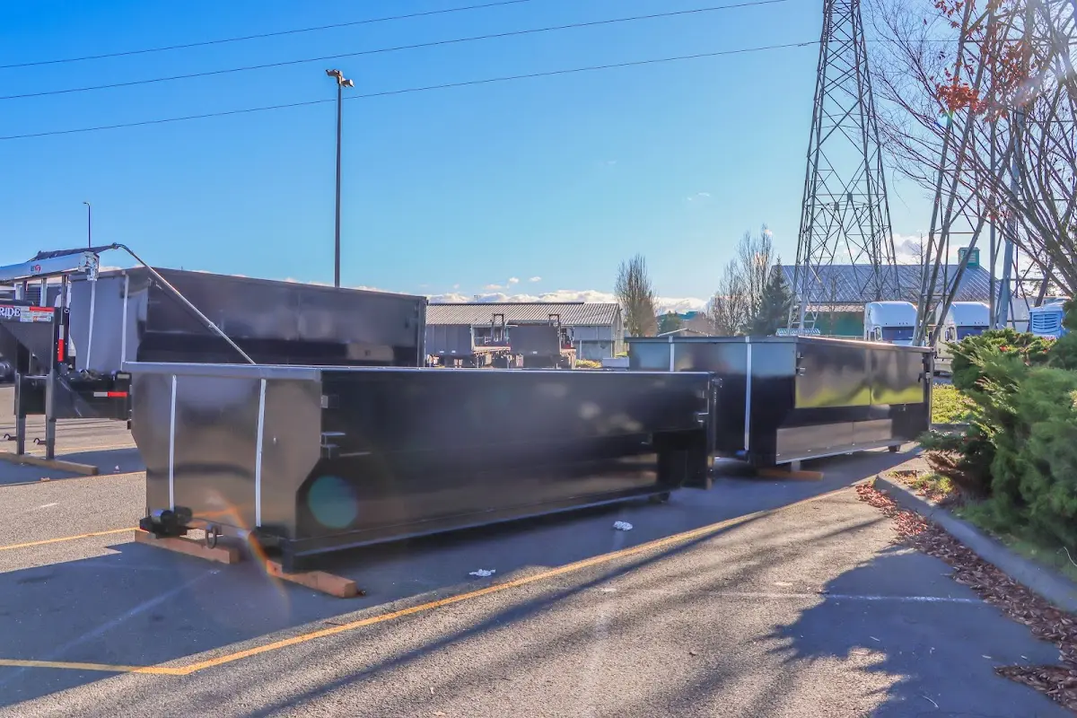 Roll-off dumpster ready for waste disposal at job site for Demolition Dumpster Rental in Fulton